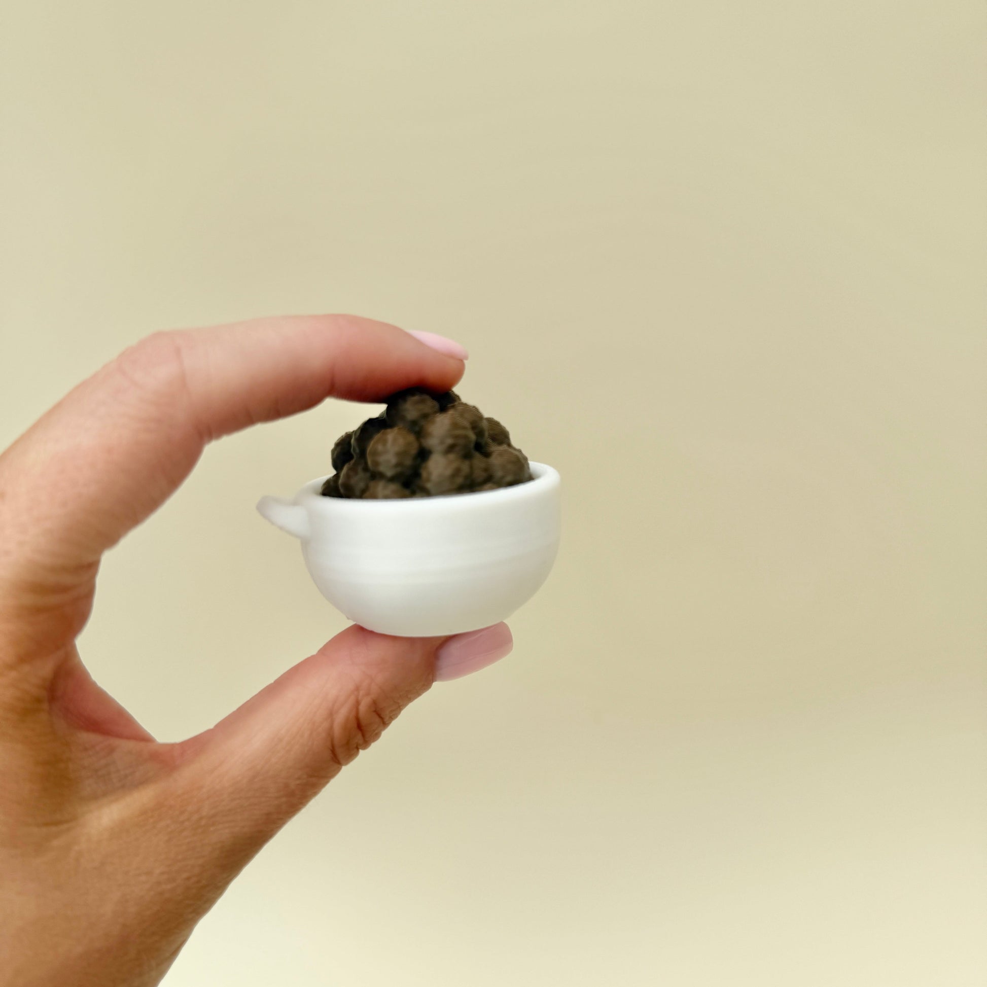 Keyring loop lets the mini cereal clicker attach to bags and lanyards for on-the-go use.
