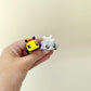 pair of miniature fidgets for tracing and grounding
