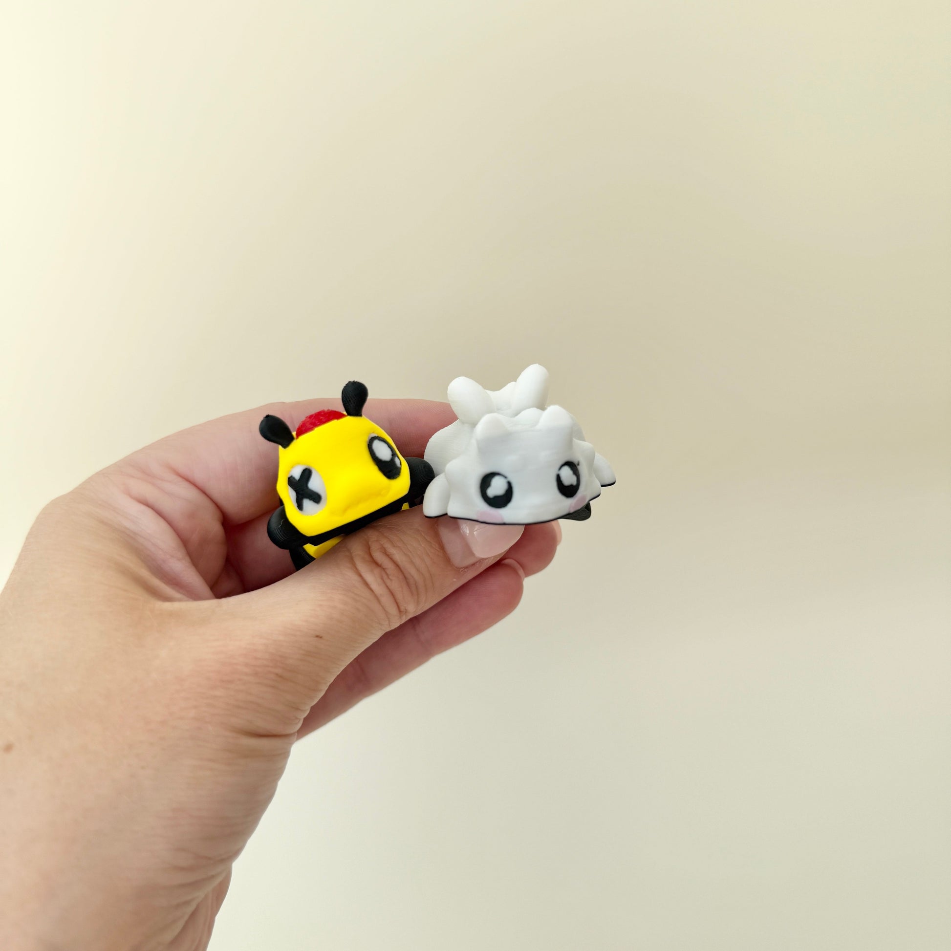 pair of miniature fidgets for tracing and grounding
