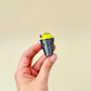 Rounded topper designed for thumb presses; low–moderate click.
