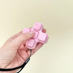 Personalised clicker toy with textured panels for grounding, focus, and tactile stimming.