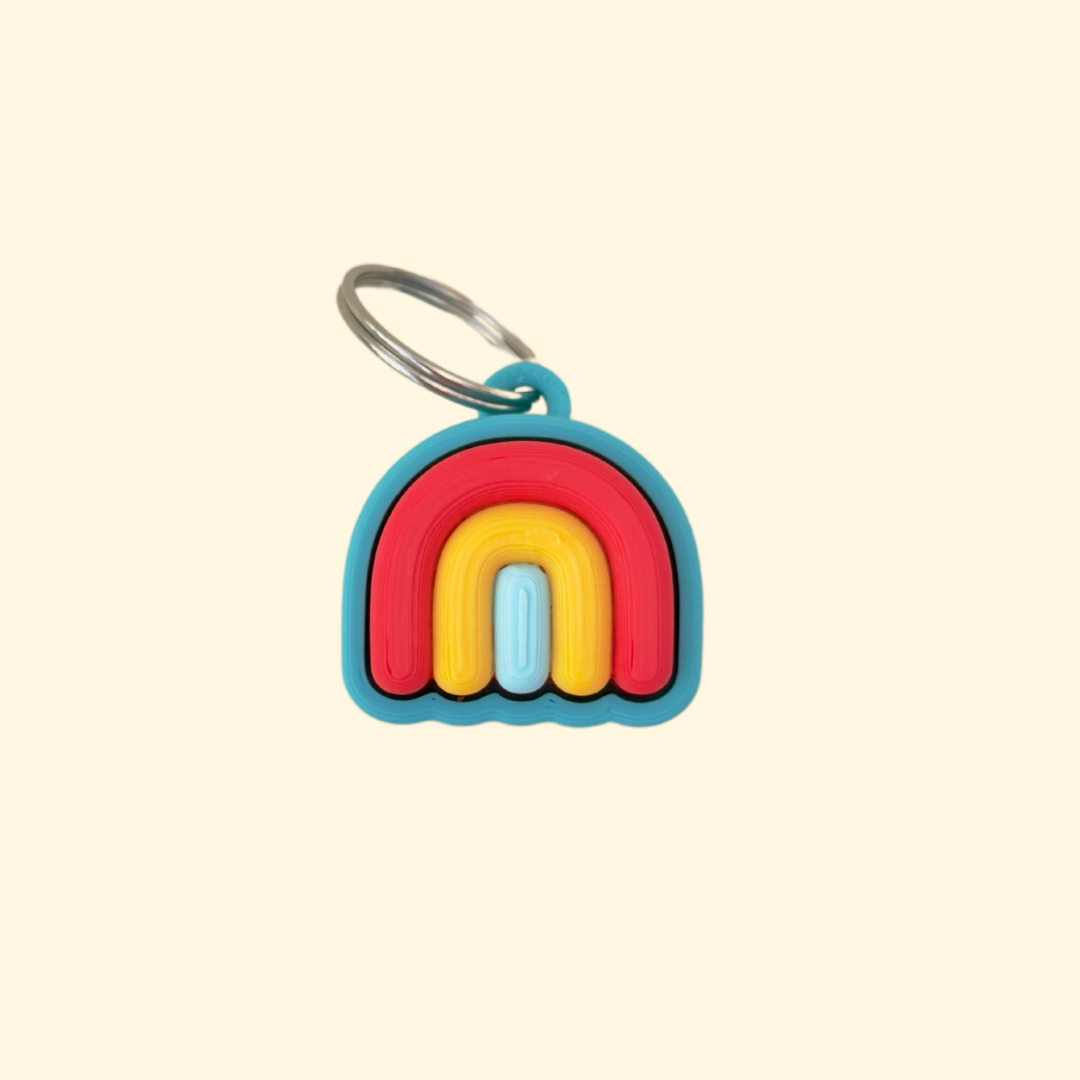 Everyday keyring fidget for grounding on the go; soft layered surface.
