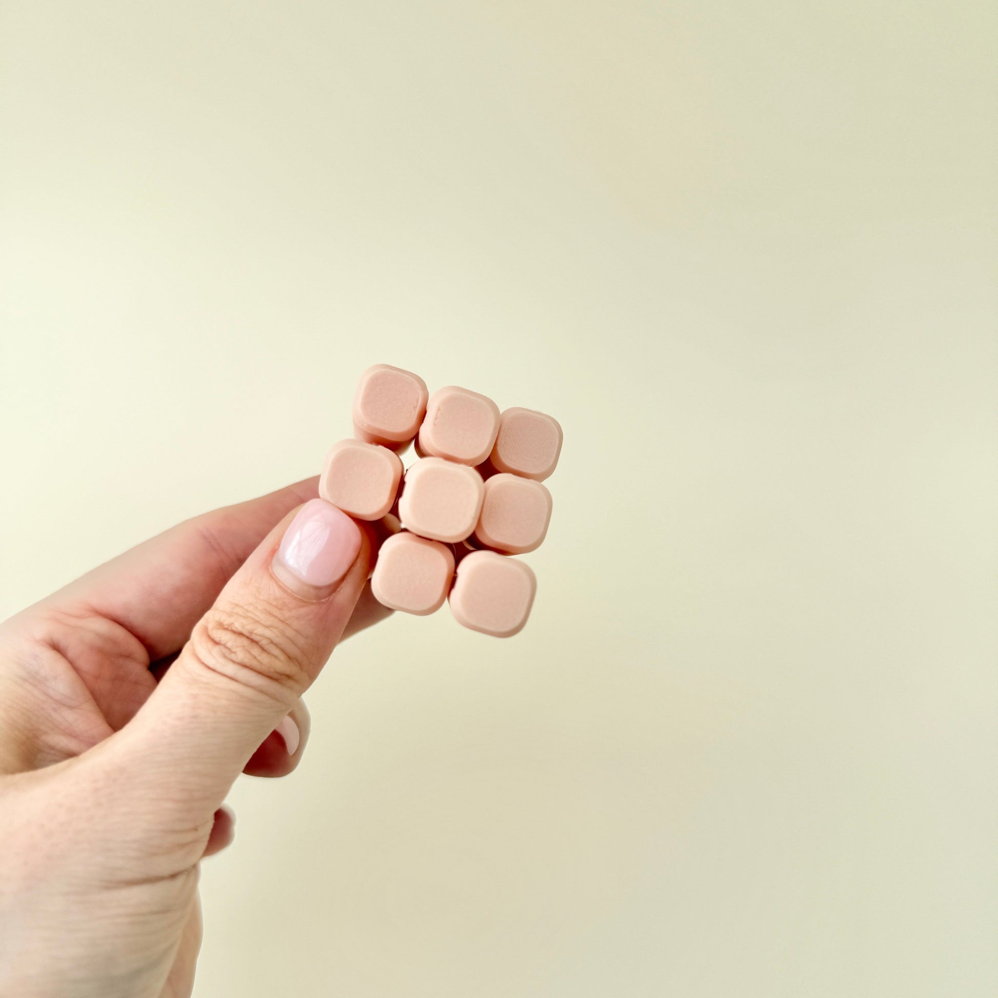 A rounded-edge fidget toy designed for younger users, ideal for focus and relaxation.