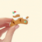 Smooth, quiet festive fidget for discreet sensory breaks.
