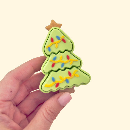 large festive fidget with three-section press and raised garland texture
