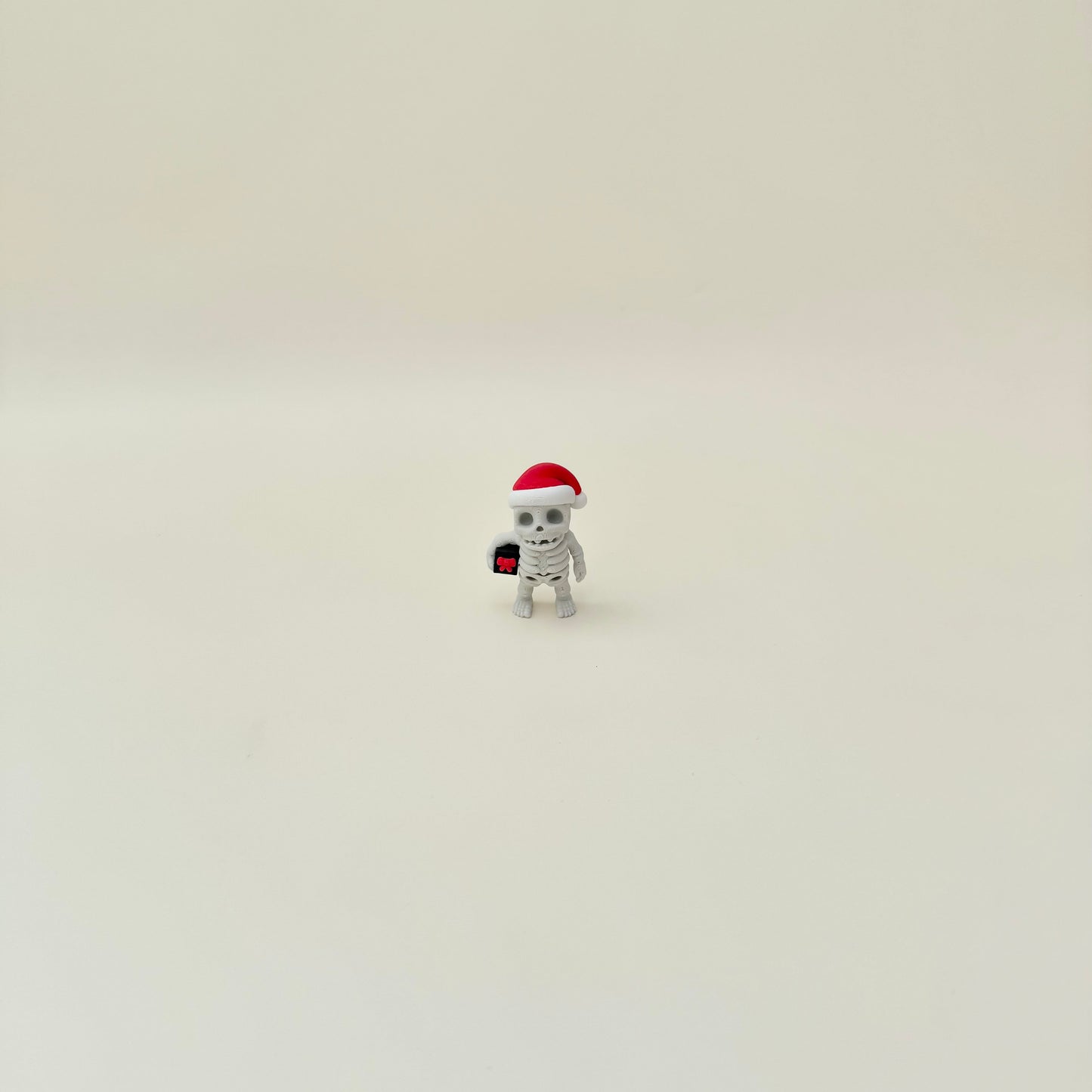 Tiny movable skeleton for quiet fidgeting and display.
