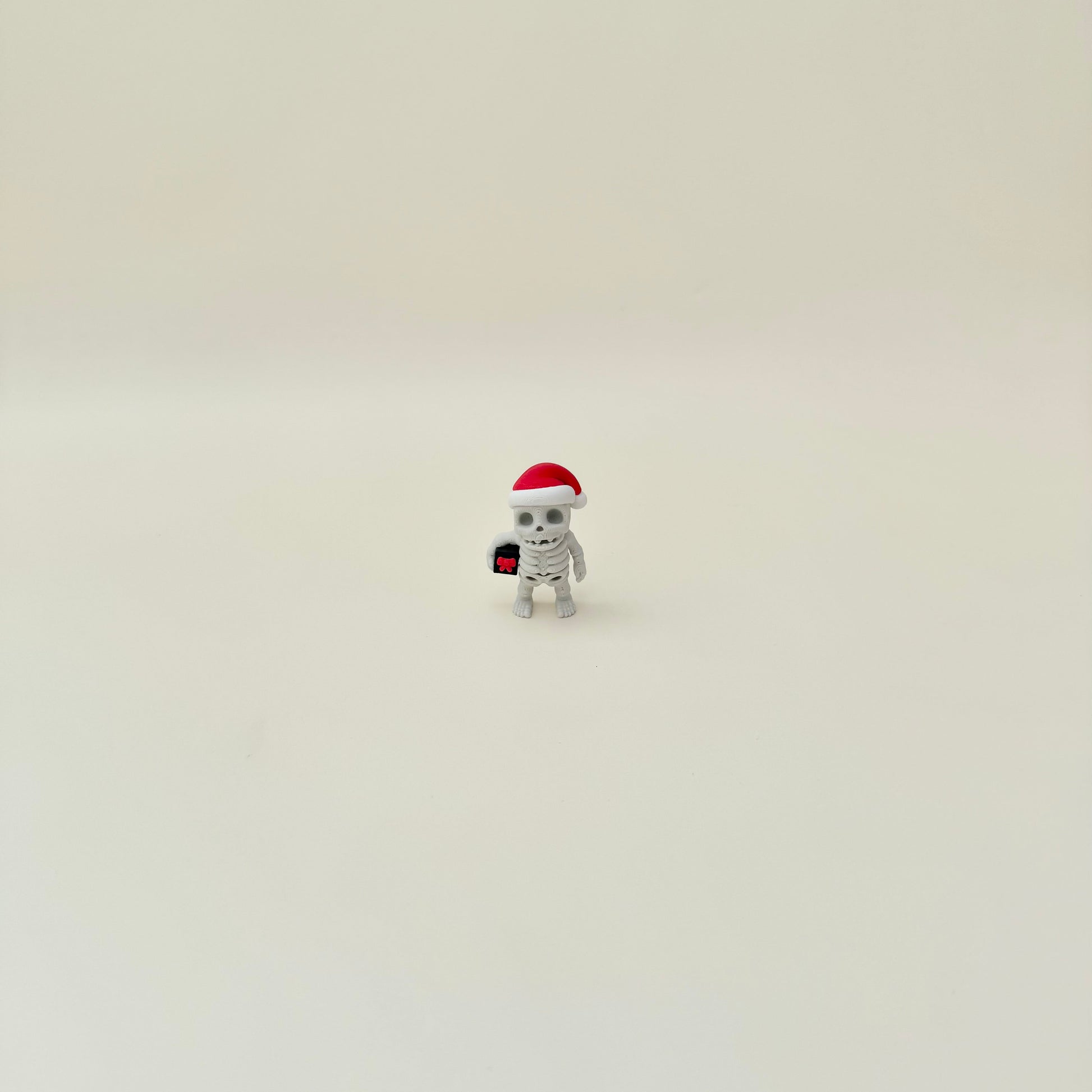 Tiny movable skeleton for quiet fidgeting and display.
