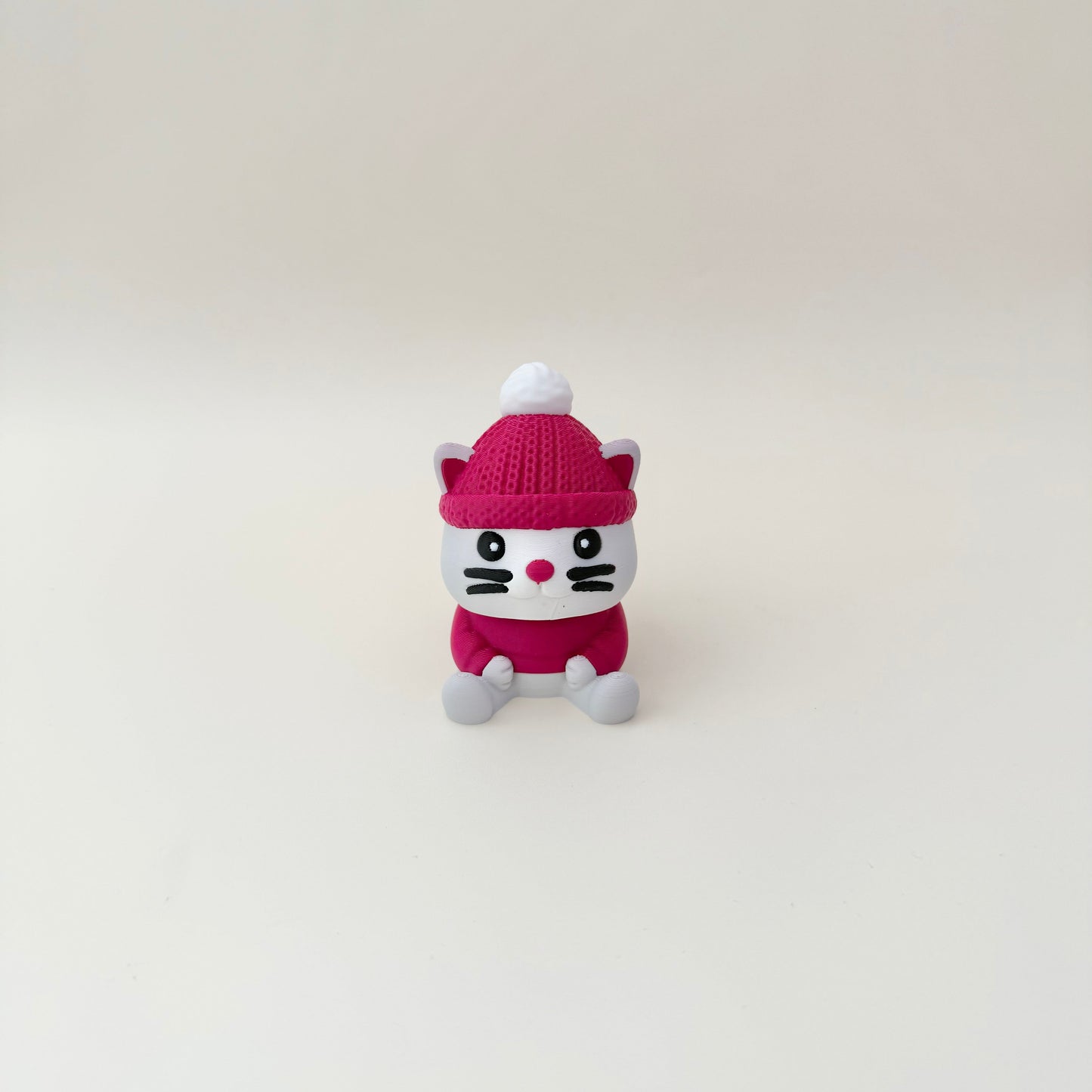 Larger handheld cat fidget designed for desks, sensory play and gifting.
