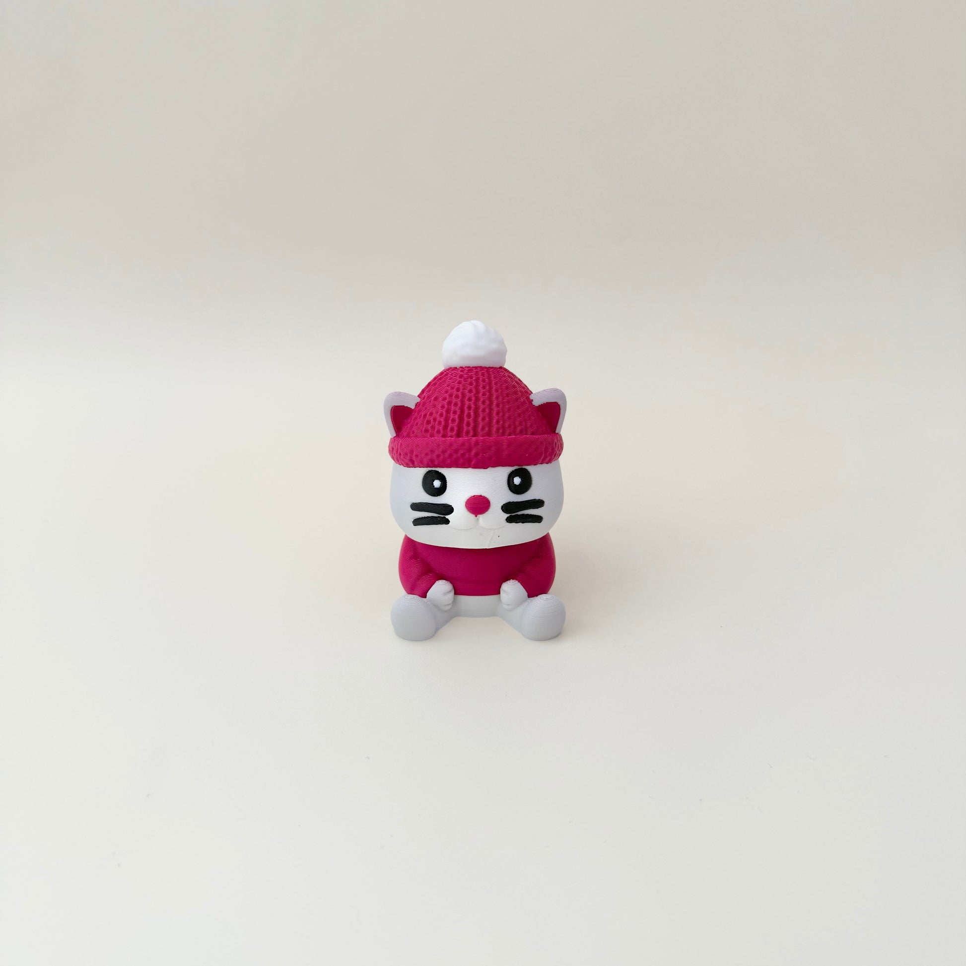 Larger handheld cat fidget designed for desks, sensory play and gifting.
