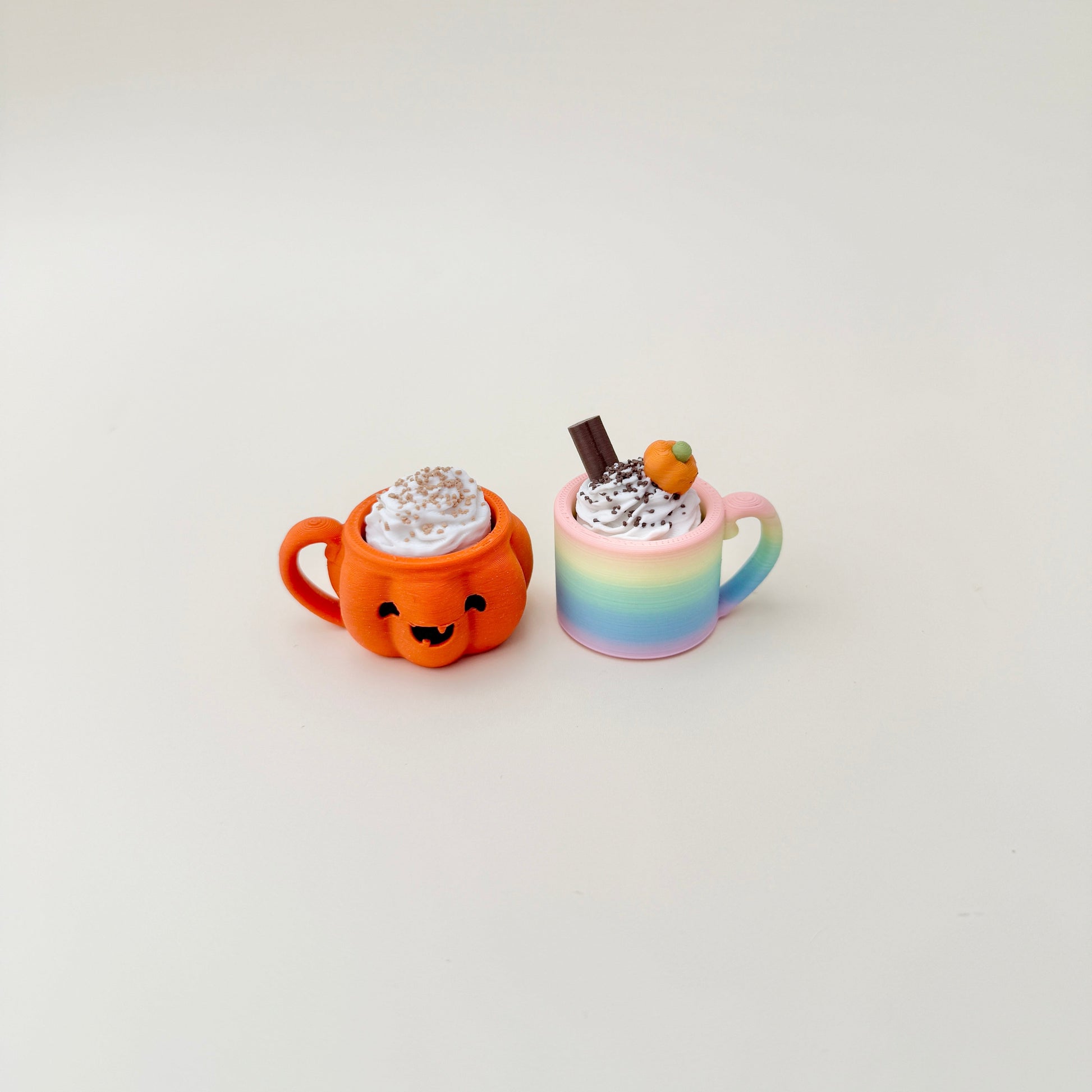 Rainbow gradient latte cup with cream and sprinkles, available with quiet click upgrade.
