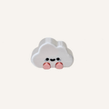 Cute mini cloud character with dangling legs and shiny finish designed for desks, shelves and calming decor spaces
