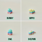 Articulated rainbow mini pet toy, designed for sensory play and easy to carry for fidgeting anywhere.