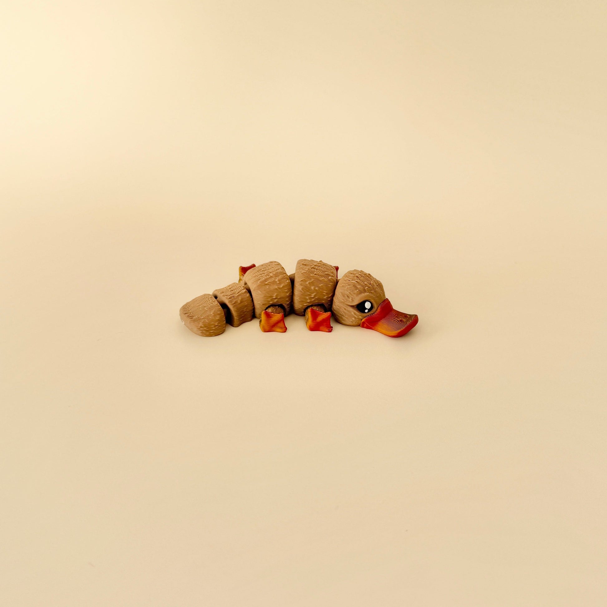 10cm realistic platypus fidget toy with flexible articulation and lifelike features, perfect for play or display.