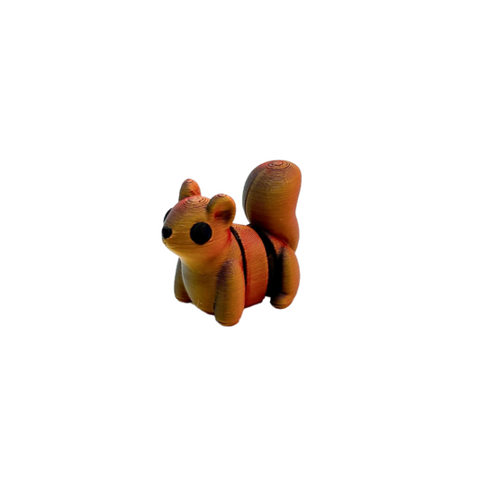 Lightweight mini fidget to trade and carry; gentle articulated movement
