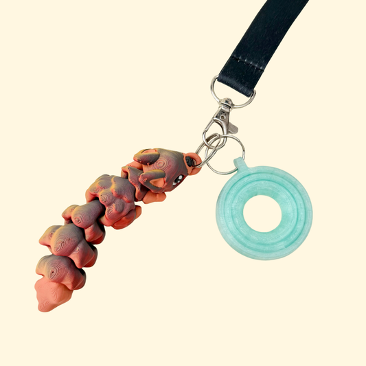 Textured sensory add-on with high movement and a longer body for grounding, tracing and busy hands.
