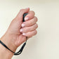 quiet palm-size stim toy that changes between black and white as it moves
