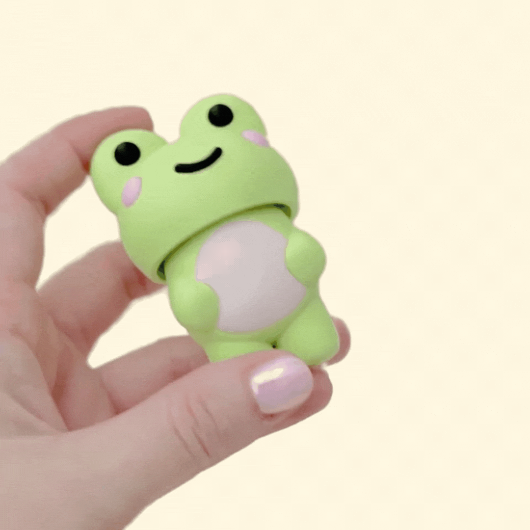 A chunky handheld frog clicker designed for grounding, rhythm and sensory comfort
