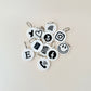 Compact NFC keyrings shown next to a coin for size comparison, emphasising their portability and practicality.