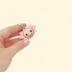 Small handheld fidget toy designed for easy travel and pocket use.