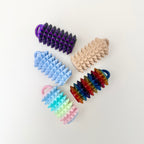 Eight-level textured fidget set for deep pressure input, stress relief, and steady hands-on grounding.
