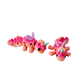 Baby Unicorn fidget toy with coral tones of red and peach, lilac wings, and a silver horn.