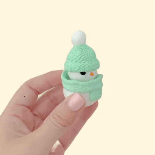 winter fidget toy, textured knit details and satisfying click
