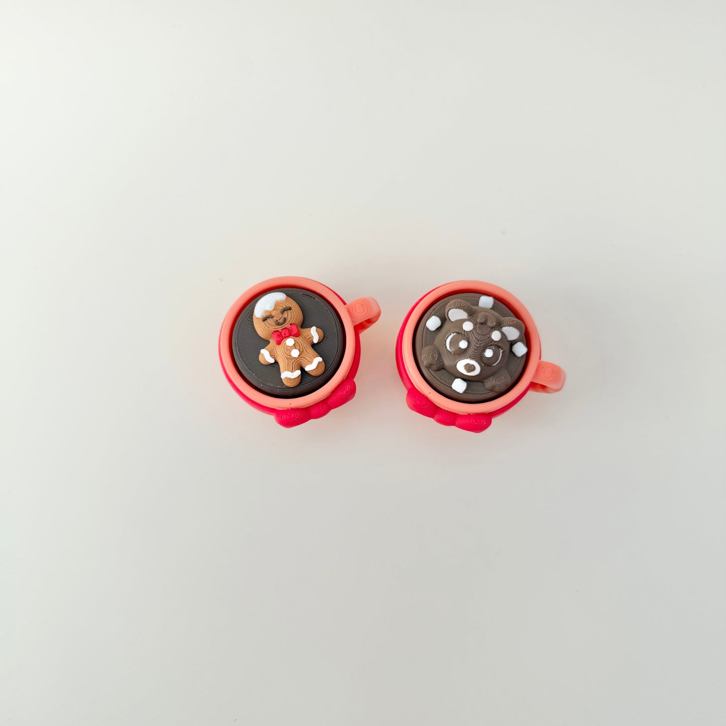 Compact festive clicker for bags, lanyards or desk stimming.
