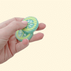 Magnetic pickle slice fidget with crinkle-cut ridges and bumpy texture for intense tactile input.
