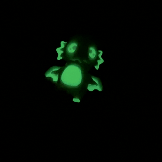 quiet articulated creature with glow accents designed for tactile stimming and display
