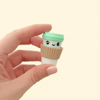 A takeaway coffee cup fidget toy with a clickable lid, designed for stress relief and sensory play.