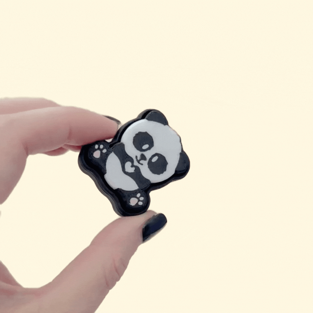 4 cm animal-shaped sensory clicker with simple smooth texture, suitable for quiet desk or bag use.