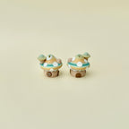 Compact sensory toy with fairy house details and gentle stimming features
