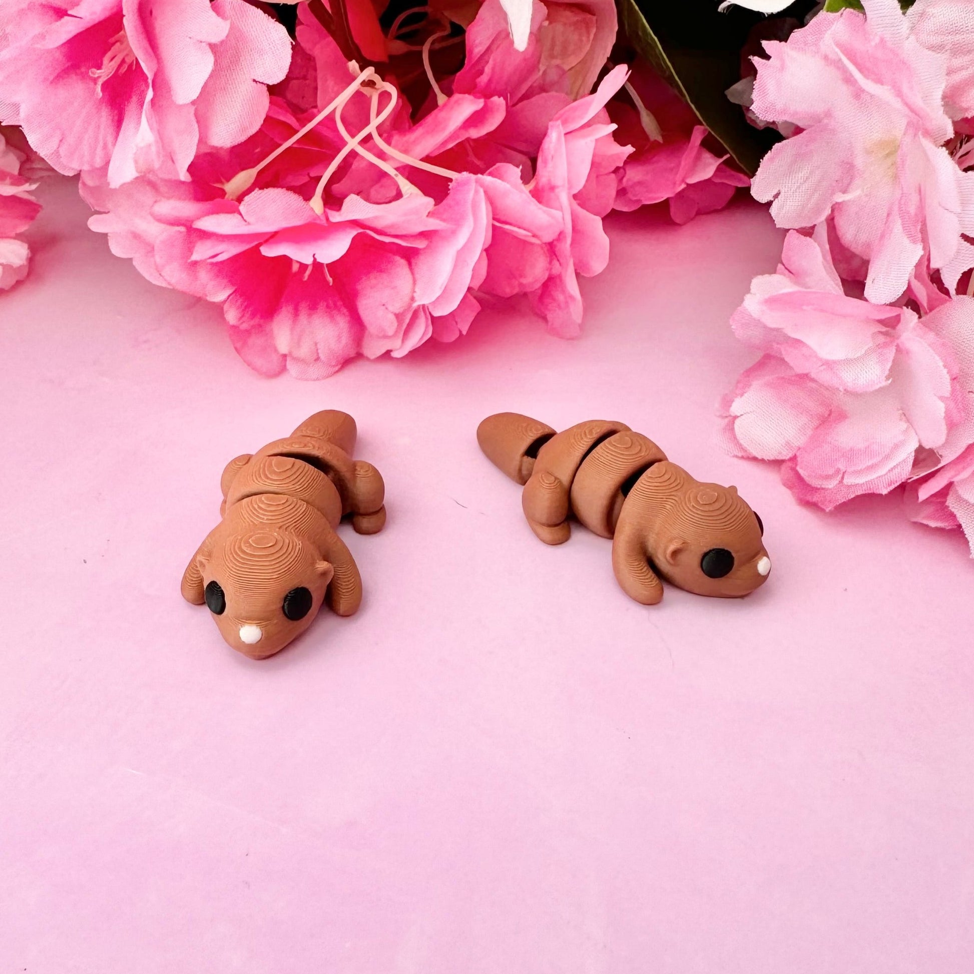 Cute Otter Fidget Toy with a soft brown body, black eyes, and a beige nose, perfect for stress relief and focus.