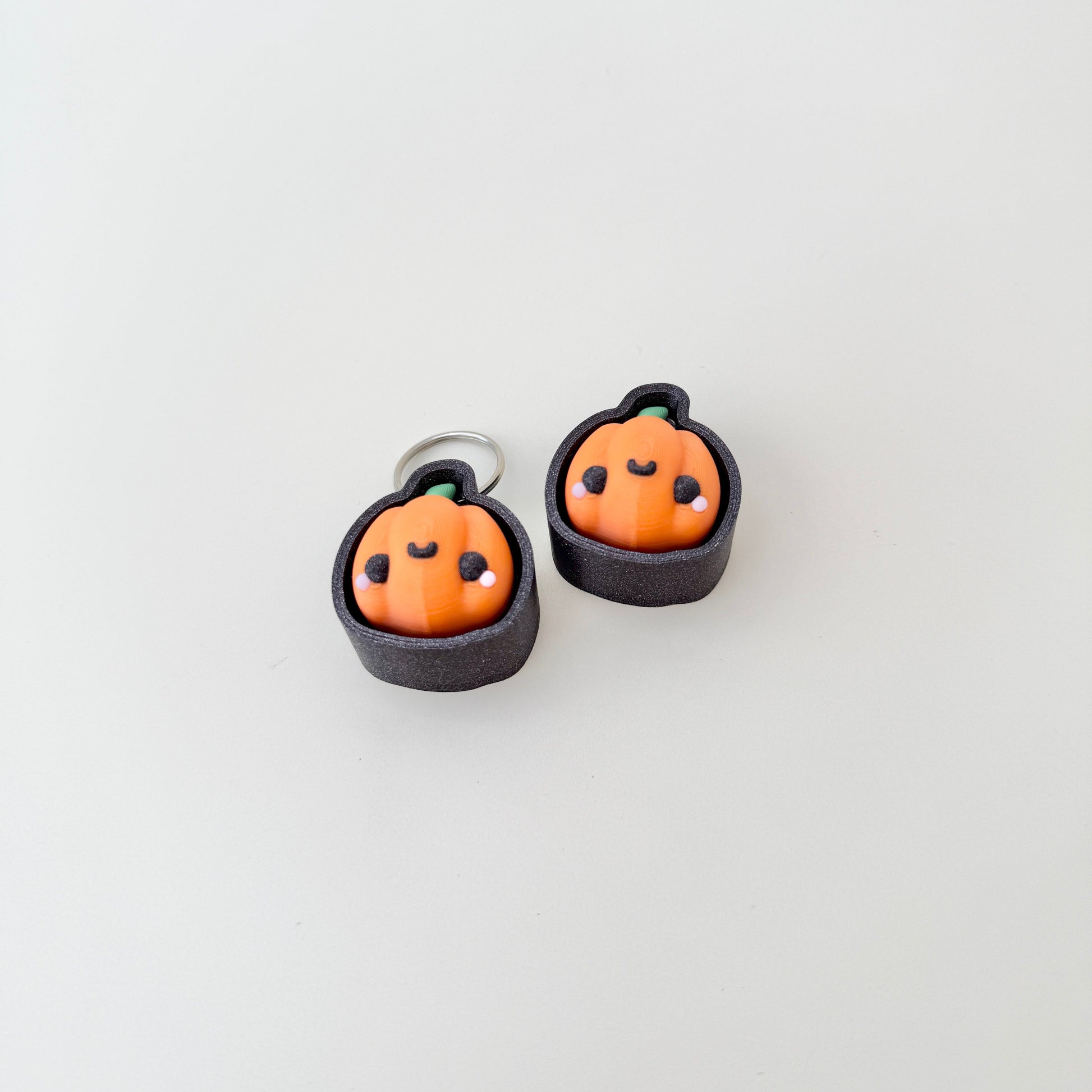 compact pumpkin clicker with raised surfaces suitable for sensory play
