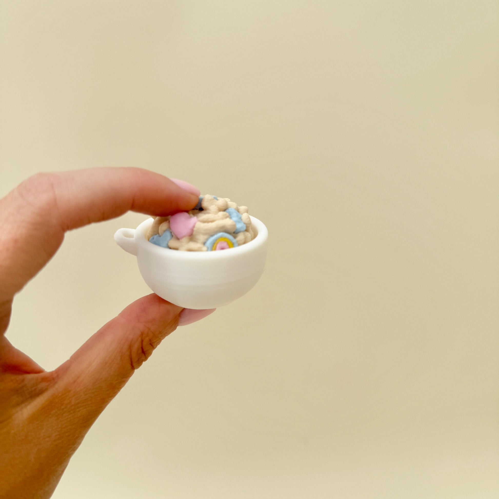 Compact cereal bowl clicker designed for quick focus breaks at a desk.
