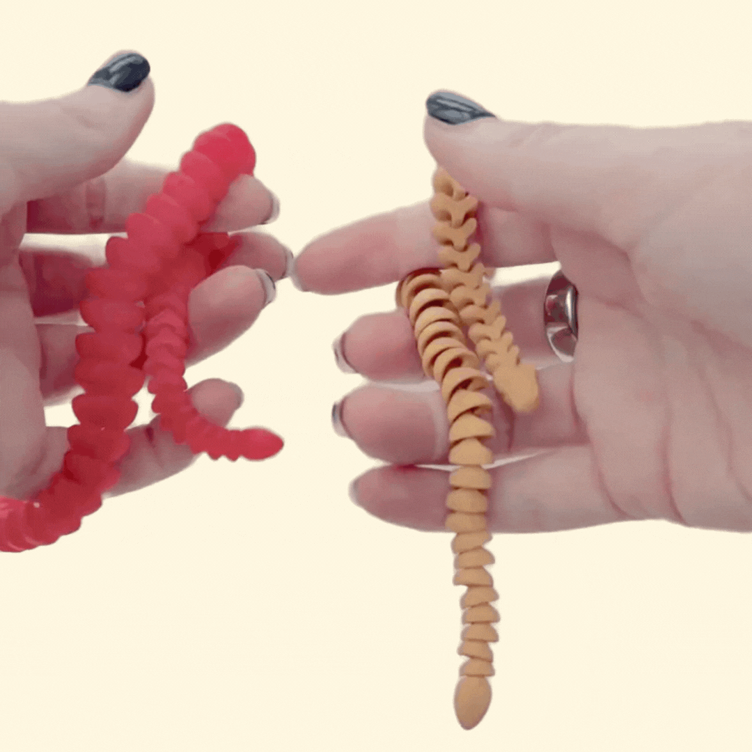 Quiet moving fidget with flowing segments for focus and calming.
