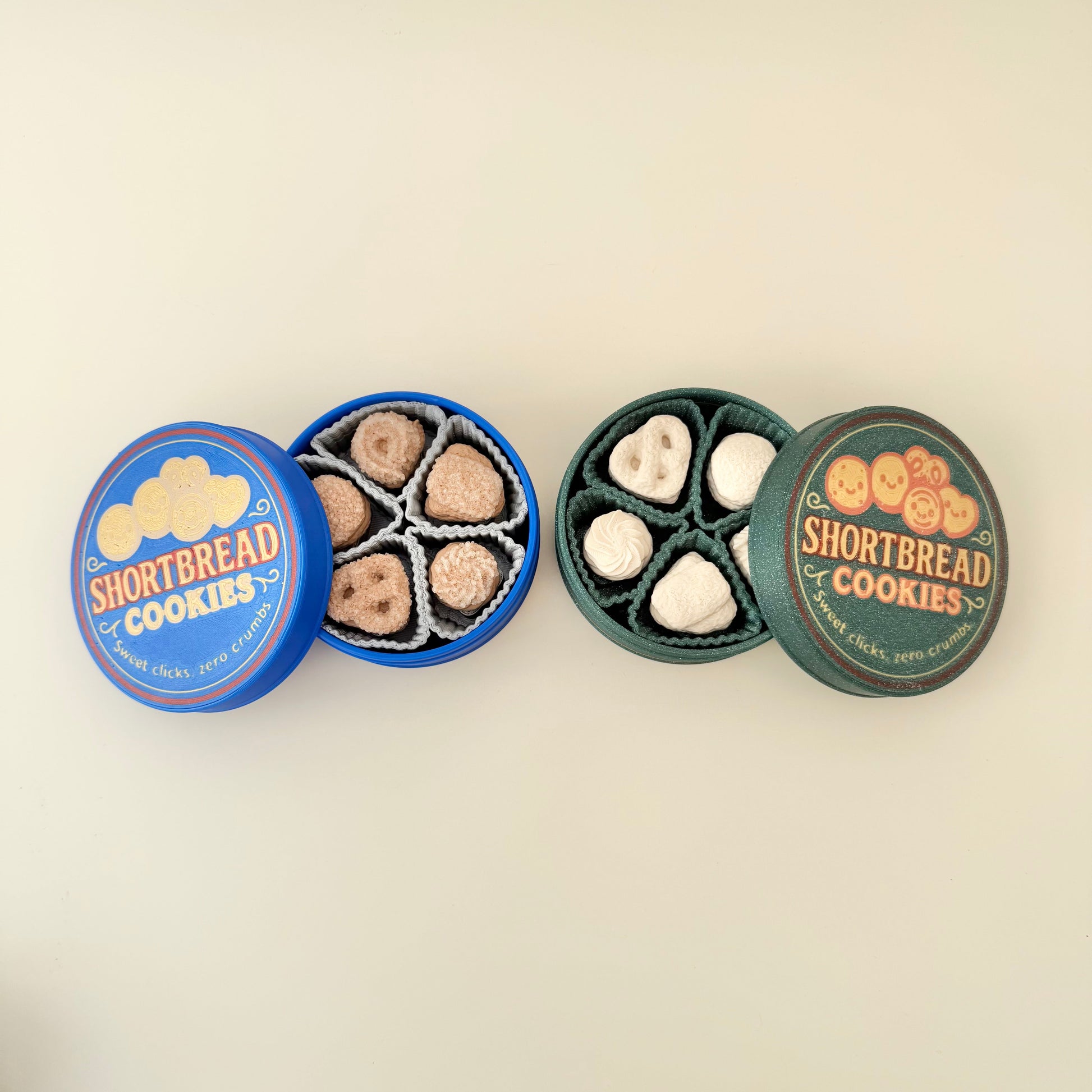 Palm-sized tin of five clickers; sturdy PLA build, normal click sound; fun gift and stocking filler for fidget fans.
