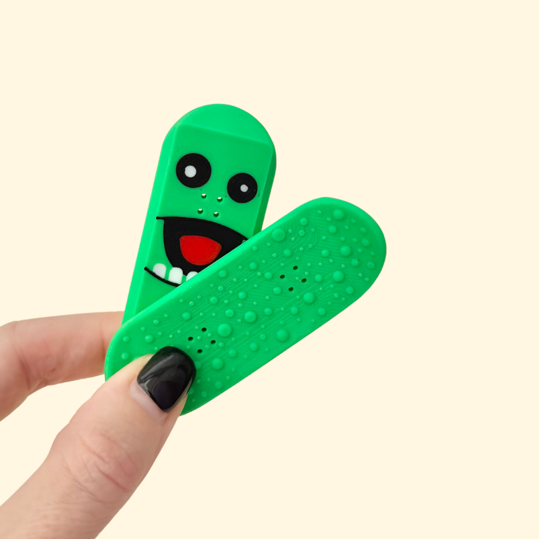 Small pickle-shaped magnet toy for desks, bags or key areas, made for idle fidgeting.
