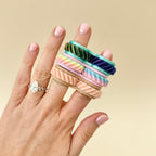 A quiet, pocket-sized fidget designed to be subtle in use, ideal for work, school, or on-the-go sensory play.