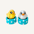 Duck clicker fidget with a press action that dips the duck into the water for tactile sensory feedback.
