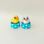 Handheld duck clicker fidget designed for focus, stimming and calming repetitive movement.
