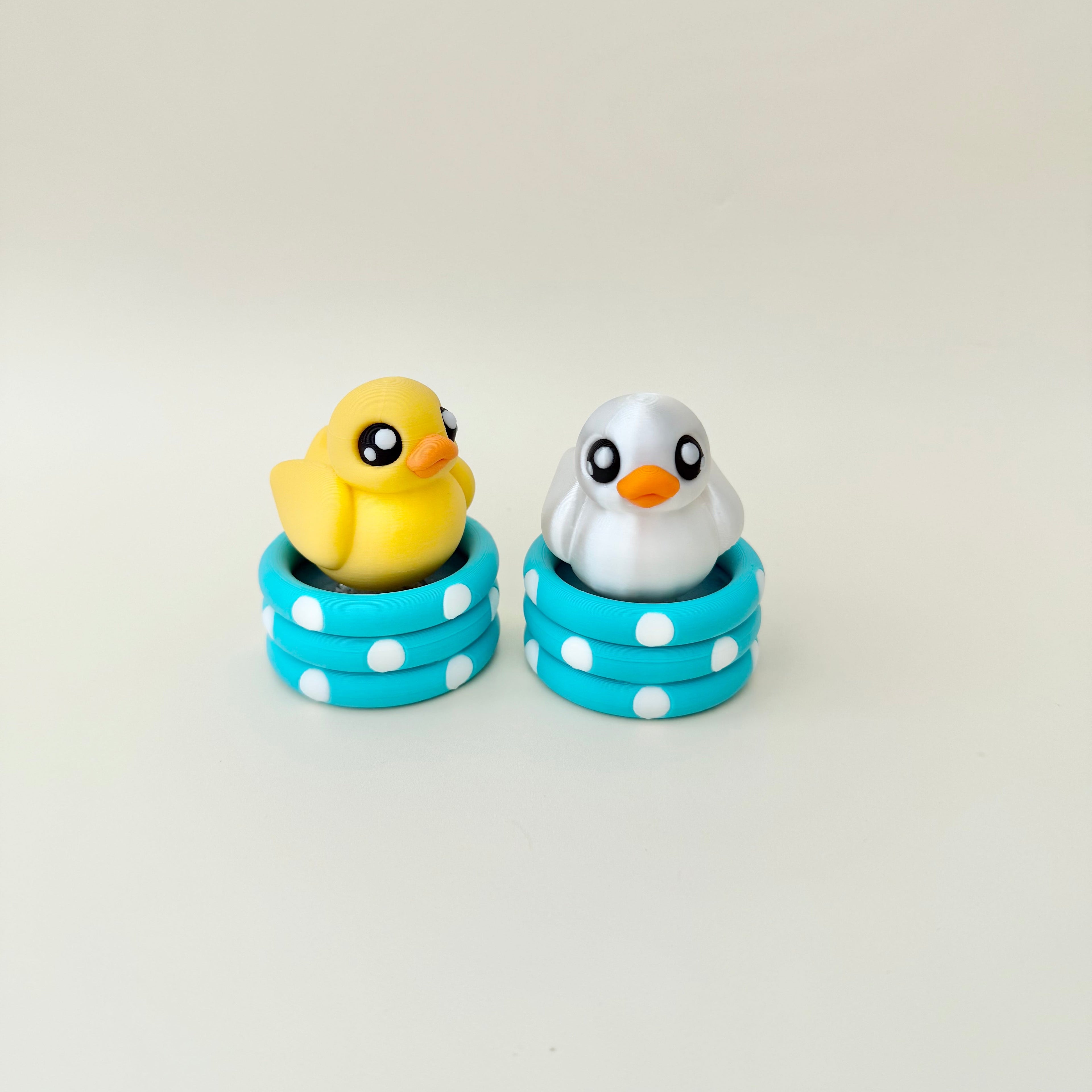 Handheld duck clicker fidget designed for focus, stimming and calming repetitive movement.
