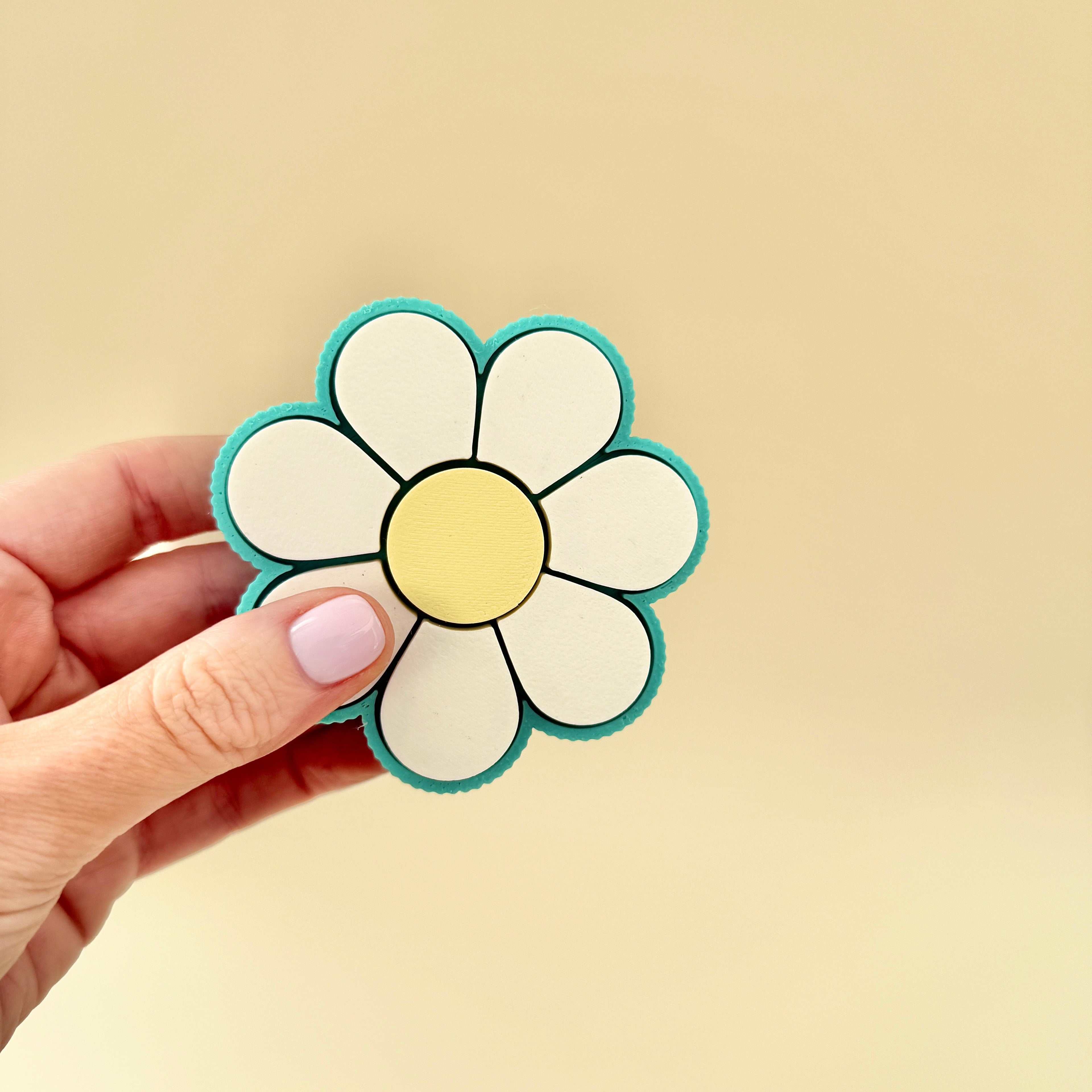 Daisy clicker fidget toy providing tactile engagement with multiple click points, ideal for neurodivergent users.