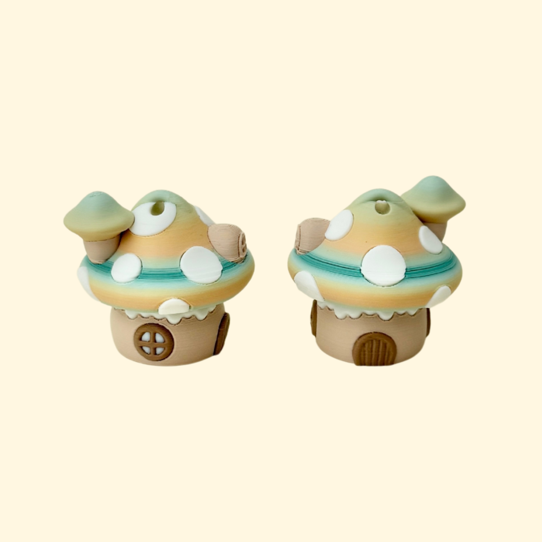 Neutral-toned mushroom-shaped fidget toy with clickable roof
