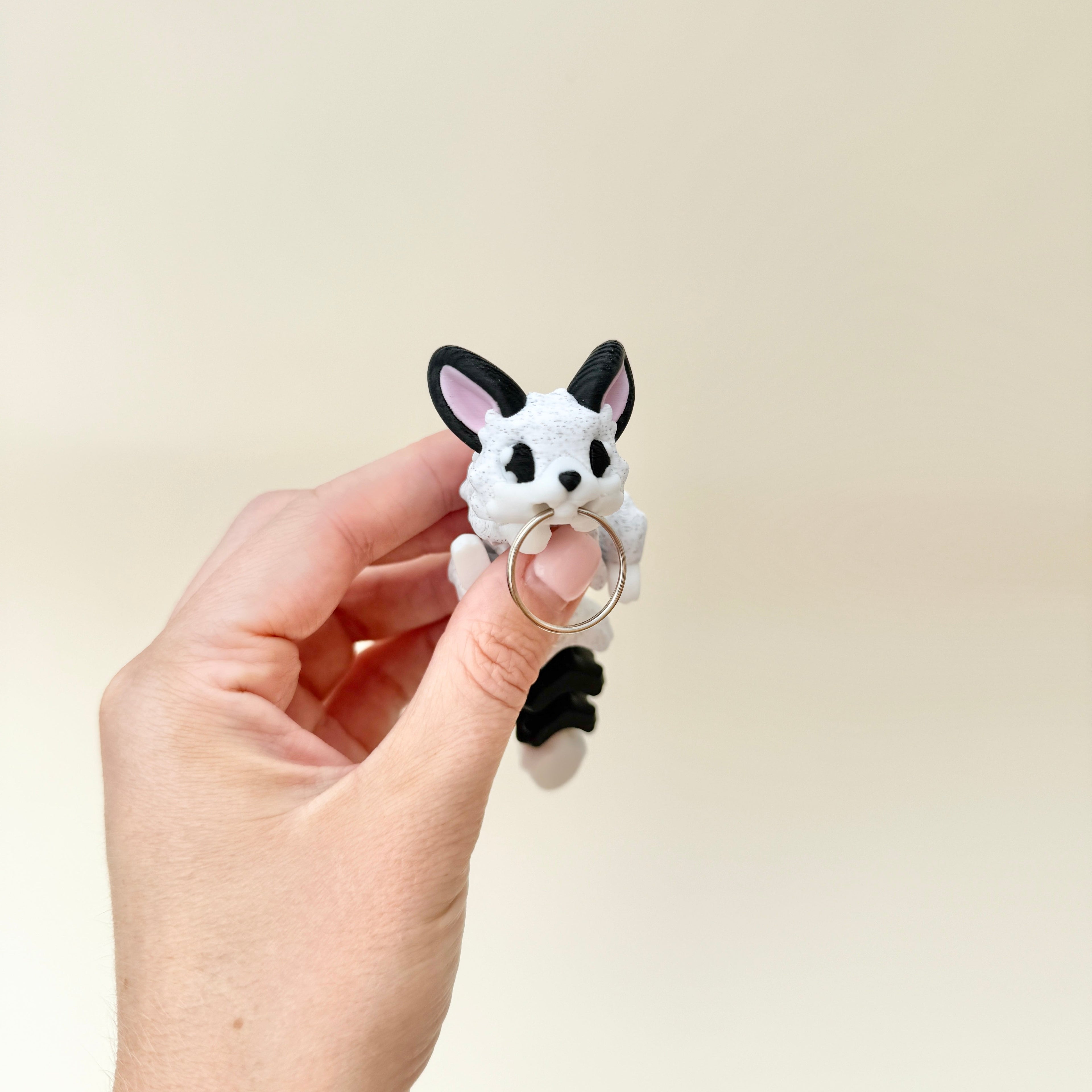 portable animal fidget with smooth articulation and tactile features
