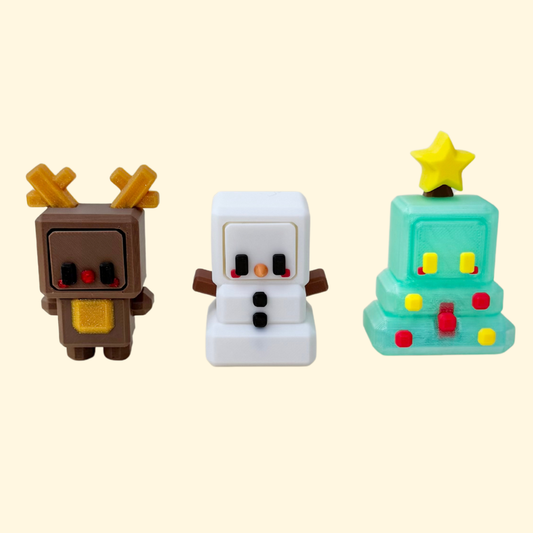 Chunky Christmas clicker with pressable face, textured edges and raised details for tactile fidgeting.
