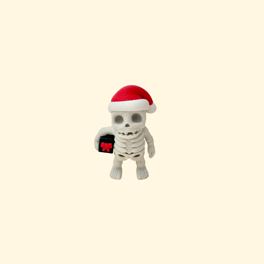 Small articulated Christmas skeleton fidget figure with seasonal colours.
