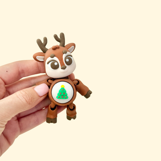 Christmas-themed handheld fidget clicker with moving parts
