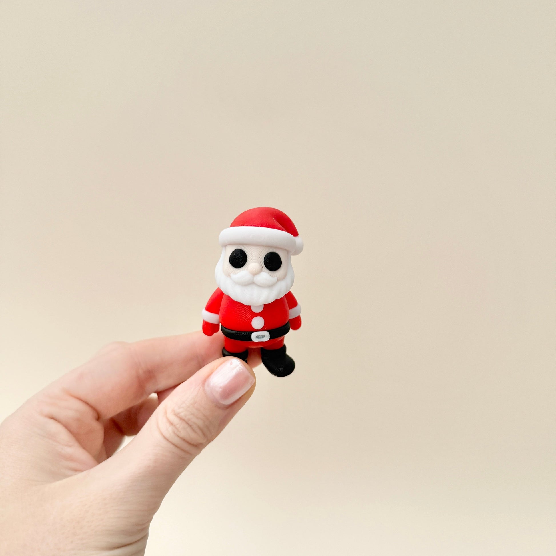 Christmas-themed fidget toy designed as Father Christmas, great for calming hands and holiday décor.