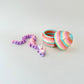 Fully articulated dragon in pastel tones with a matching rainbow egg decorated with embossed star details.